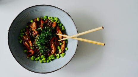 Delicious noodle dish with edamame and herbs, perfect for healthy meals.